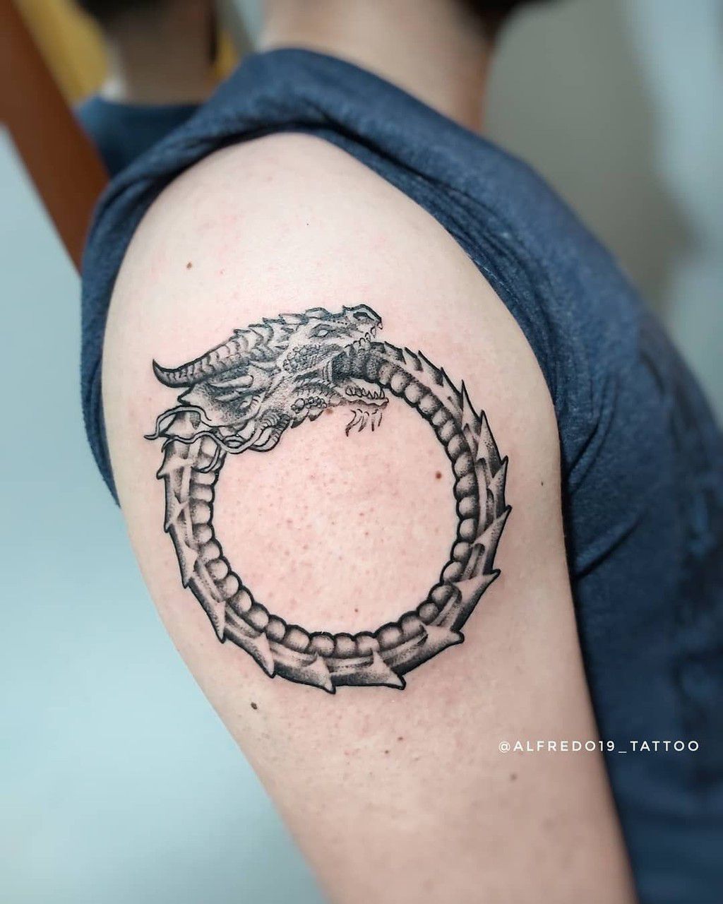 The Ouroboros tattoo [Pinterest]