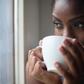Black woman drinking tea [Stocksy]