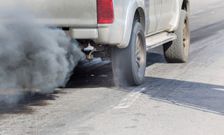 Air pollution from vehicle exhaust pipe on roadToa55/Getty Images