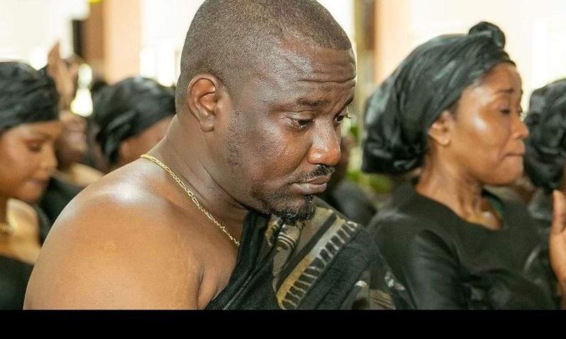 John Dumelo crying at mother's funeral