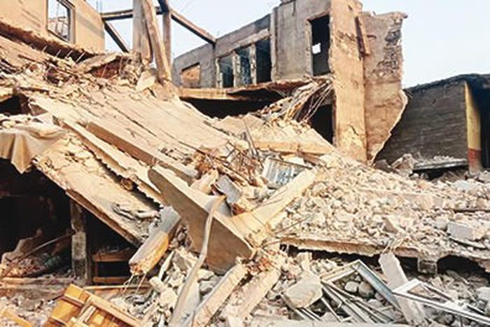 An illustrative image of a collapsed building. [Punch]
