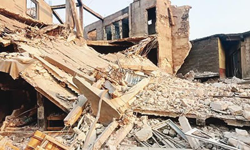 An illustrative image of a collapsed building. [Punch]