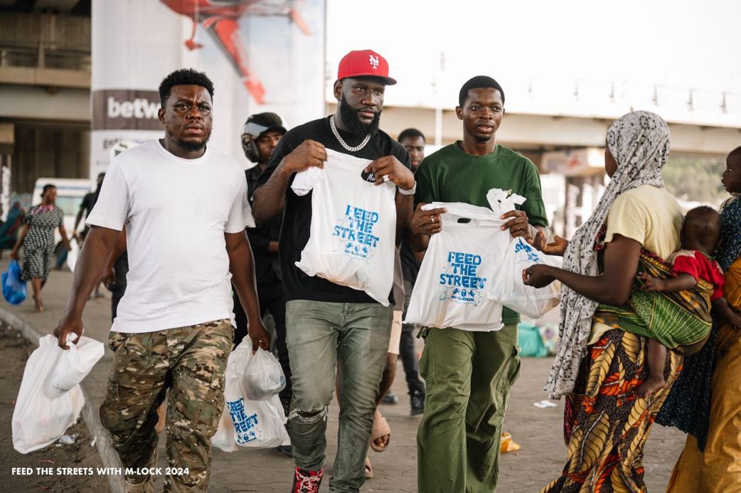 Merdalock feeds thousands on the street, donates cash gifts to families