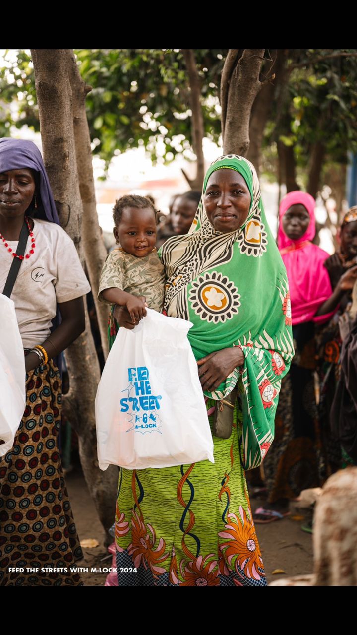Merdalock feeds thousands on the street, donates cash gifts to families