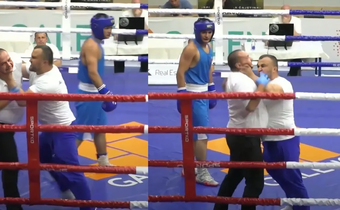Boxing coach angrily storms ring, attacks referee during bout (Video)
