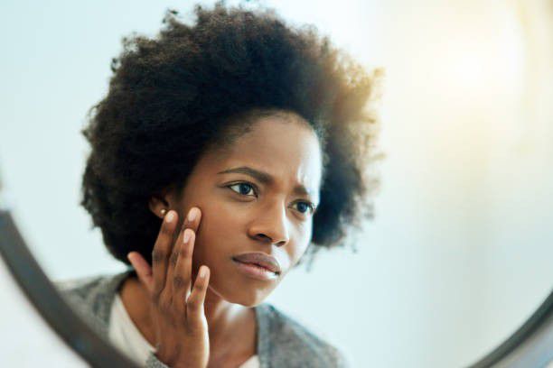 Avoid touching your face too much [iStock]