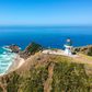 Cape Reinga Lighthouse on New Zealand's North Island is a place of spiritual significance for Maori.