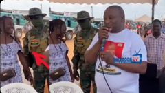 Soldier guarding Hassan Ayariga 'flirts' with lady, during boss's campaign speech