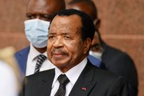 Cameroon's President Paul Biya waits for the arrival of France's President Emmanuel Macron (unseen) for talks at the Presidential Palace in Yaounde, on July 26, 2022. [Getty Images]