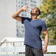 Avoid drinking water while standing [AdobeStock]