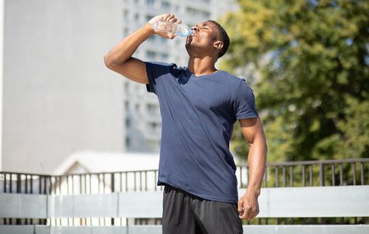Avoid drinking water while standing [AdobeStock]