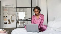 Dangers of using your laptop in bed [Depositphotos]