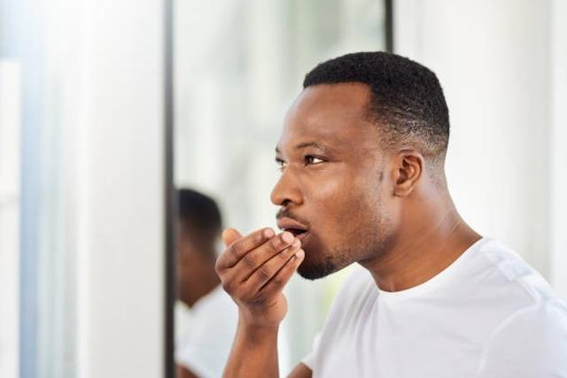 Habits that give bad mouth odour [istockphoto]