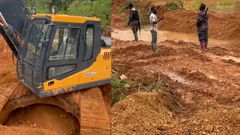 Excavator operator films police officers taking 'chop money' from illegal miners