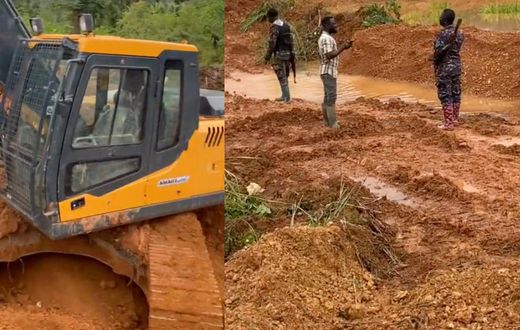 Excavator operator films police officers taking 'chop money' from illegal miners
