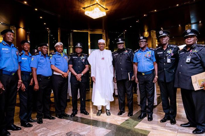 President Buhari and officers of the Nigerian Police Force, including the Inspector General of Police, Ibrahim Idris