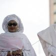 Nigerian President Mohammadu Buhari arrives with his wife Aisha, before taking oath of office at the Eagles Square in Abuja, on May 29, 2015