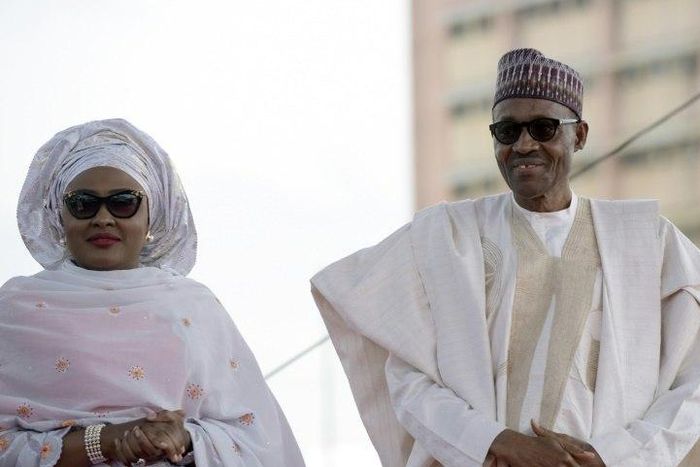 Nigerian President Mohammadu Buhari arrives with his wife Aisha, before taking oath of office at the Eagles Square in Abuja, on May 29, 2015