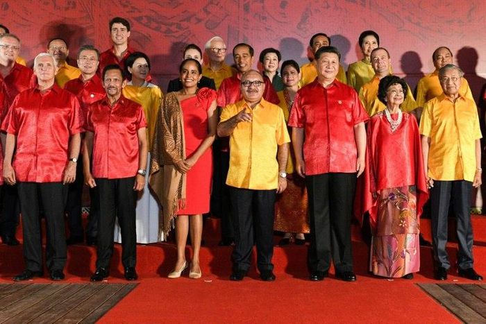 In an APEC tradition, leaders donned local costume for the gala dinner