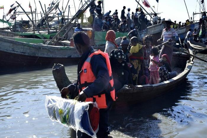 Rohinghya stopped at sea trying to flee Myanmar are returned, often destitute after paying traffickers, to the camps they left
