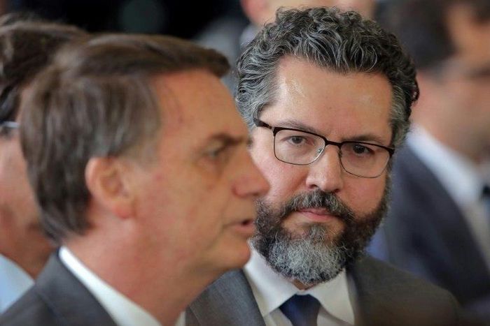 Ernesto Araujo (right) has been picked as foreign minister due to his close alignment with the world vision of president-elect Jair Bolsonaro (L), say experts