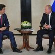 Japanese Prime Minister Shinzo Abe (L) told Russian President Vladimir Putin he was willing to discuss a peace treaty between the two countries, which are still technically at war