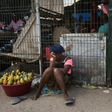 Traders in Angola struggle to eke out a living as an economic 'miracle' promised by President Joao Lourenco remains elusive for most