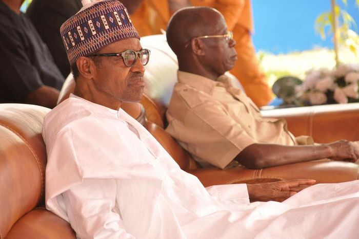 President Muhammadu Buhari with national chairman of the All Progressives' Congress (APC), Adams Oshiomhole