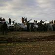 Turkish-backed Syrian fighters gather with their vehicles at a position near the northern Syrian town of Manbij, though the US military says it has seen no indication of the Syrian army entering the city