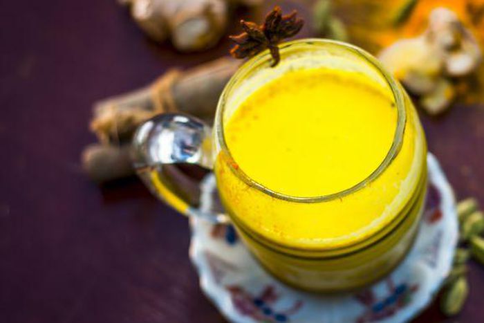 ___9158415___2018___12___2___9___golden-milk-with-species-like-green-cardamom-royalty-free-image-899359158-1543419038