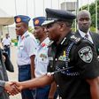 President Muhammadu Buhari shakes hands with Inspector-General of Police, Ibrahim Idris