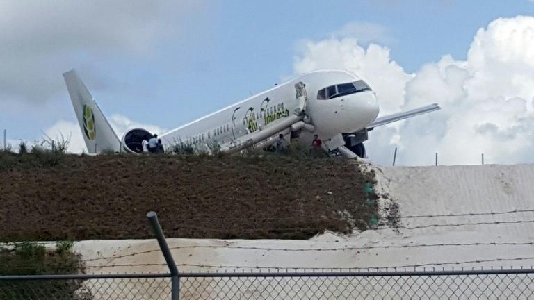 The Fly Jamaica plane, which had been carrying 126 people on its way to Toronto, seen after crash-landing at the Cheddi Jagan International Airport in Georgetown, Guyana on November 9, 2018