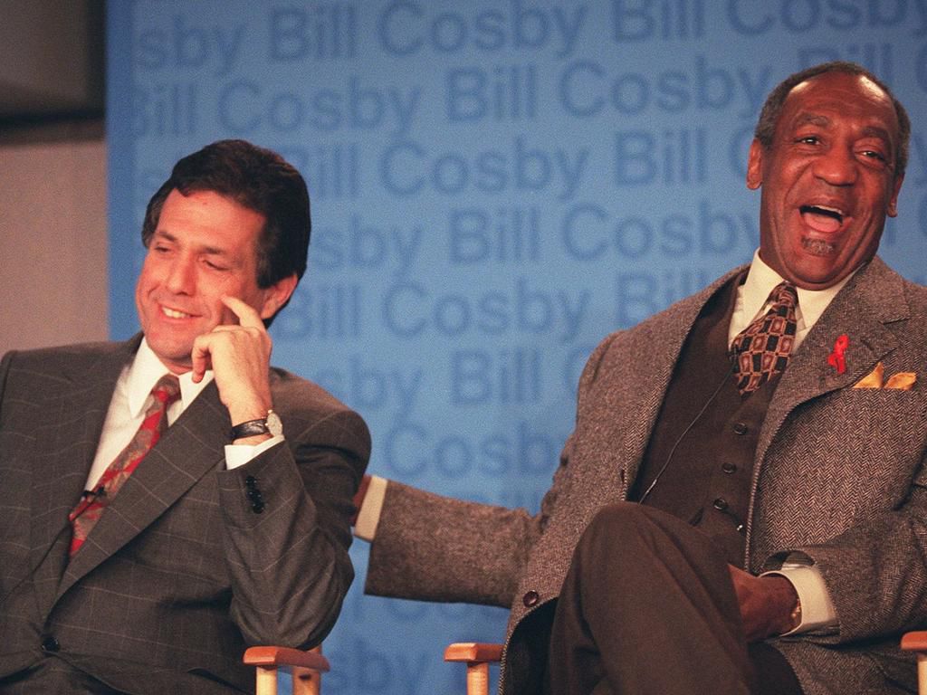 Moonves and Bill Cosby in December 1995 at a news conference announcing Cosby would be joining CBS.