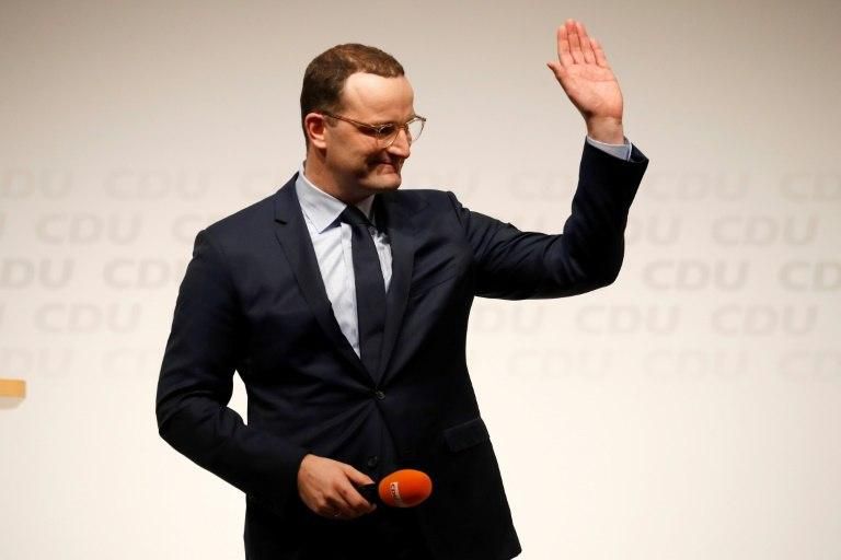 Jens Spahn, a 38-year-old openly gay minister in Merkel's cabinet who long railed against her refugee policy, is the wild card in the race
