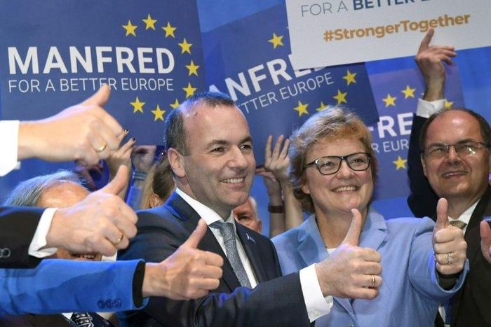 Manfred Weber (C) won the backing of 79.2 percent of delegates of the European People's Party (EPP) meeting in Helsinki