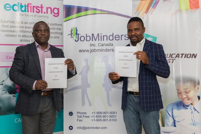 L-r: Vice President, Business Development at JobMinders, Charles Osazuwa, and Co-Founder and CEO, EduFirst.ng, displaying the agreement signed on Thursday at Skool Media office in Lagos
