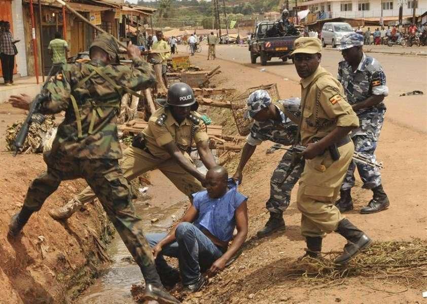 Soldiers beating up a civilian
