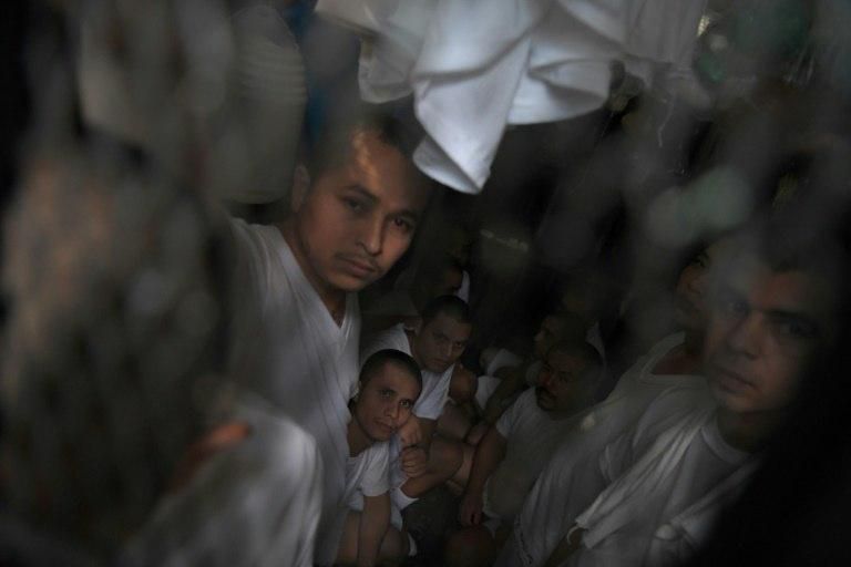 Gang members being held in tiny cells at a police station jail in Ilopango, San Salvador