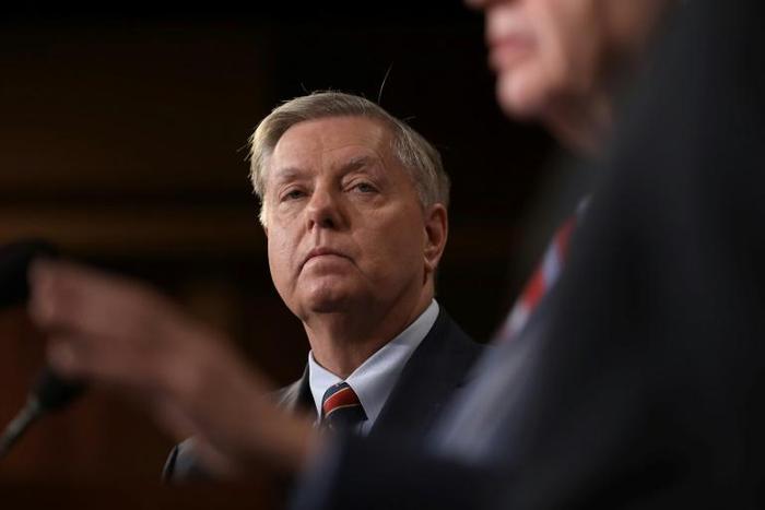 US Senator Lindsey Graham, pictured at a November 2018 news conference at the US Capitol, said he would urge President Donald Trump to 'reconsider' his planned Syria pullout