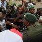 Senator Dino Melaye clashes with police officers at Abuja protest