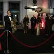 George Conway stands in the background as his wife Kellyanne Conway speaks to reporters at an event for President Donald Trump's 2017 inauguration