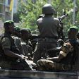 Guinean soldiers, similar to these pictured in 2010, opened fire ona group of men leaving a house in Conakry, killing two of them