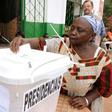 A woman casts her ballot to vote in the second round of the presidential election on May 18, 2014 in Guinea-Bissau; the country will hold a legislative election March 10, 2019