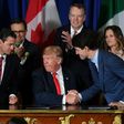 Mexican President Enrique Pena Nieto (L), US President Donald Trump (C) and Canadian Prime Minister Justin Trudeau are pictured after signing a new free trade agreement in Buenos Aires, on November 30, 2018, on the sidelines of the G20 Leaders' Summit