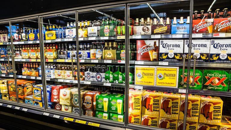 ___9064704___2018___11___2___22___grocery-store-beer-cooler-royalty-free-image-520888525-1541173712