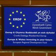 The 12 stars of the European Union displayed next to the Welsh dragon at Swansea University's new campus, which the EU helped finance