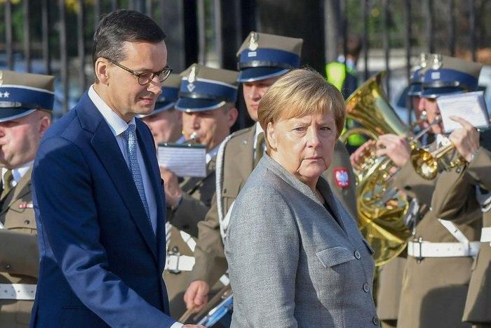 Poland is unlikely to adopt the UN migration pact, Prime Minister Mateusz Morawiecki told a press conference with German Chancellor Angela Merkel