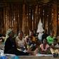 The UN says there are about 25 million refugees globally -- here, a refugee family from the Democratic Republic of Congo (DRC) wait in a makeshift shelter before their registration at a settlement in western Uganda