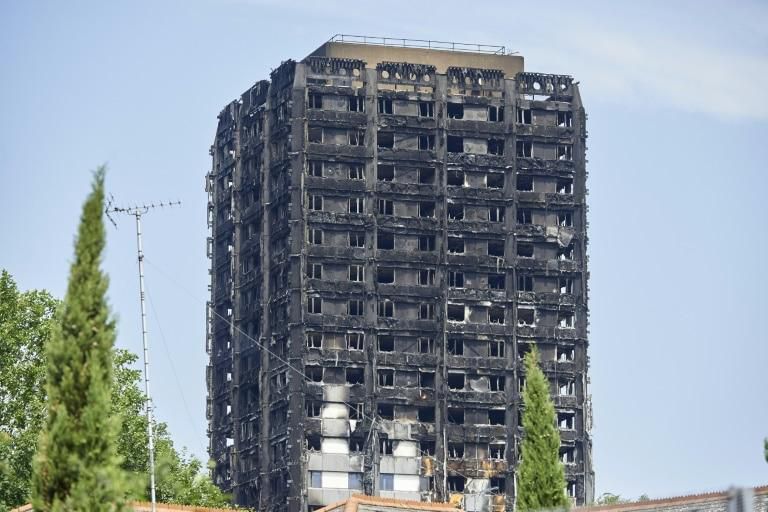 The burned-out shell of the Grenfell Tower block in North Kensington, west London pictured on June 20, 2017