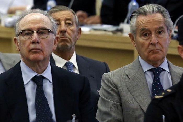 Former IMF chief Rodrigo Rato (L) has already been sentenced to four and a half years in prison for embezzlement. The new trial will focus on the allegedly fraudulent listing of Bankia bank